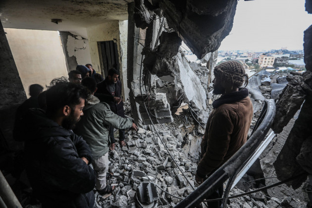 palestians-search-the-rubble-of-a-house-that-was-hit-by-israeli-bombardment-late-the-previous-night-in-rafah-in-the-southern-gaza-strip-on-tuesday-march-19-2024-fourteen-palestinians-were-killed