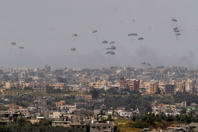 parachutes-drop-supplies-into-the-northern-gaza-strip-as-seen-from-southern-israel-wednesday-march-27-2024-ap-photoohad-zwigenberg