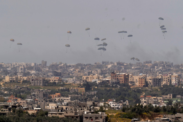 parachutes-drop-supplies-into-the-northern-gaza-strip-as-seen-from-southern-israel-wednesday-march-27-2024-ap-photoohad-zwigenberg