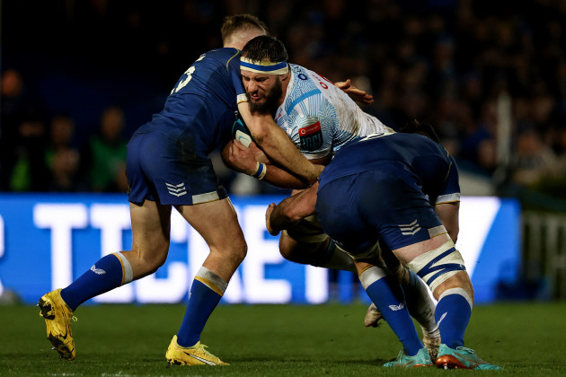 marcell-coetzee-is-tackled-by-jordan-larmour-and-jack-conan