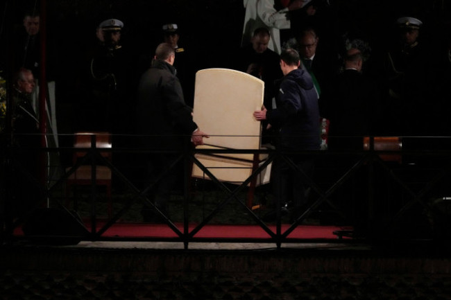 vatican-ushers-carry-pope-francis-chair-prior-to-the-start-of-the-via-crucis-way-of-the-cross-at-the-colosseum-on-good-friday-in-rome-friday-march-29-2024-ap-photogregorio-borgia