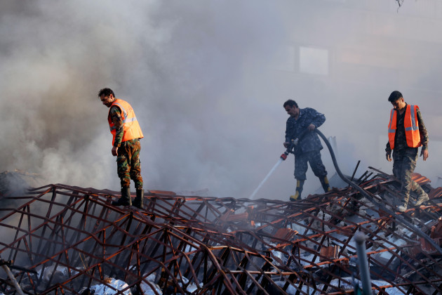 emergency-services-work-at-a-destroyed-building-hit-by-an-air-strike-in-damascus-syria-monday-april-1-2024-an-israeli-airstrike-has-destroyed-the-consular-section-of-irans-embassy-in-damascus-k