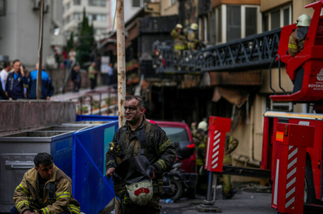 firefighters-and-emergency-teams-work-in-the-aftermath-of-a-fire-that-broke-out-during-day-time-in-a-nightclub-in-istanbul-turkey-tuesday-april-2-2024-a-fire-at-an-istanbul-nightclub-during-renov