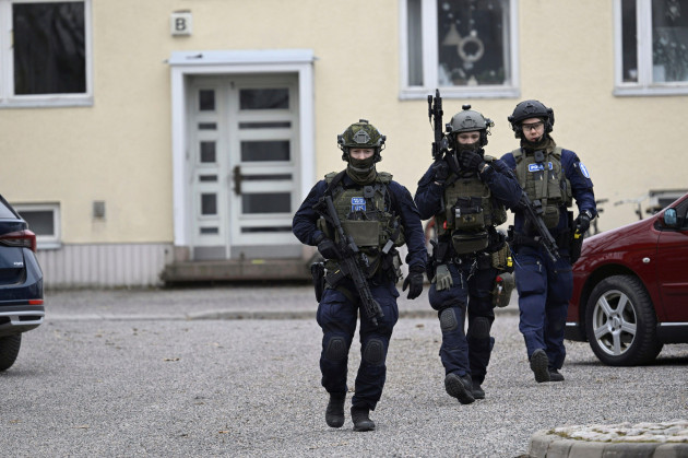 police-officers-at-the-scene-of-viertola-comprehensive-school-in-vantaa-finland-tuesday-april-2-2024-finnish-police-say-a-number-of-people-were-wounded-in-a-shooting-at-a-school-outside-helsinki