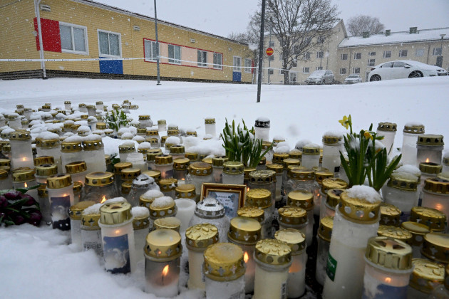 candles-flowers-and-other-memorabilia-are-placed-at-the-viertola-school-in-vantaa-finland-wednesday-april-3-2024-a-12-year-old-student-opened-fire-at-a-secondary-school-in-southern-finland-on-tu