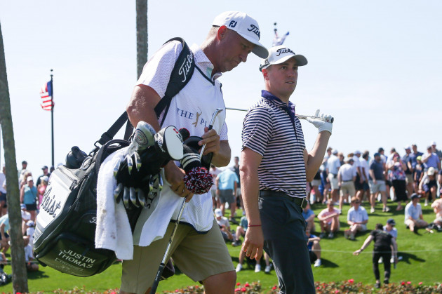 ponte-vedra-beach-florida-usa-15th-mar-2024-justin-thomas-r-and-his-caddie-jim-bones-mackay-walk-off-the-3rd-tee-during-the-second-round-on-the-2024-players-championship-at-tpc-sawgrass-c