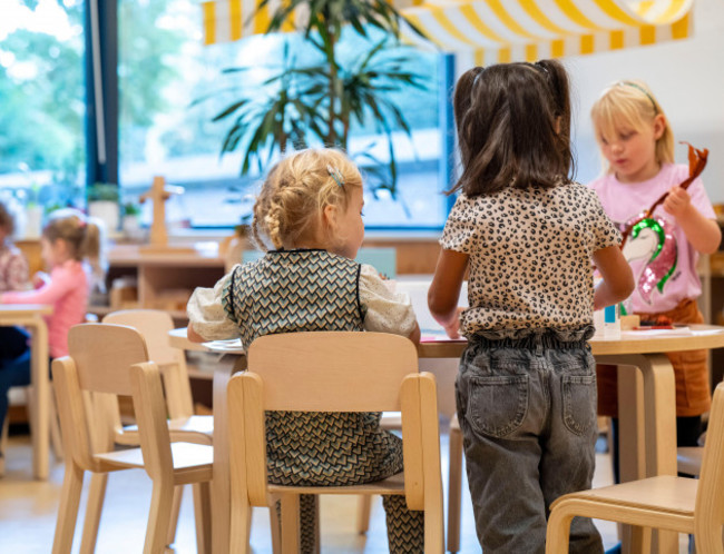 little-classmates-engaged-in-a-creative-activity-at-preschool