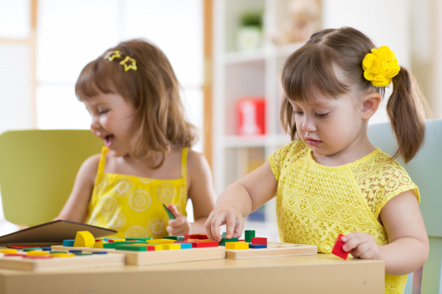 preschool-children-playing-with-educational-sorter-toys-in-classroom-kindergarten-or-home