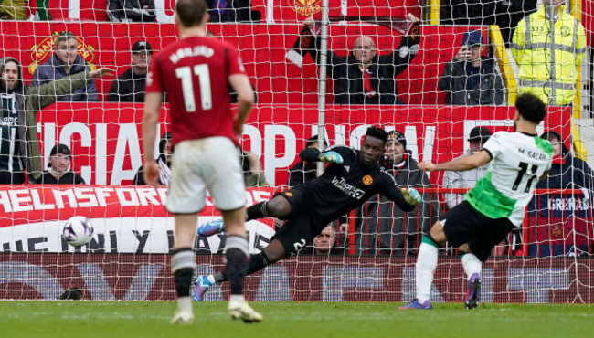 manchester-uk-7th-apr-2024-mohamed-salah-of-liverpool-r-scores-a-penalty-during-the-premier-league-match-at-old-trafford-manchester-picture-credit-should-read-andrew-yatessportimage-credit