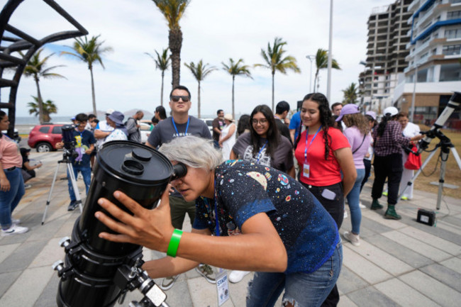 an-amateur-astronomer-prepares-her-telescope-a-day-before-a-total-solar-eclipse-in-mazatlan-mexico-sunday-april-7-2024-ap-photofernando-llano