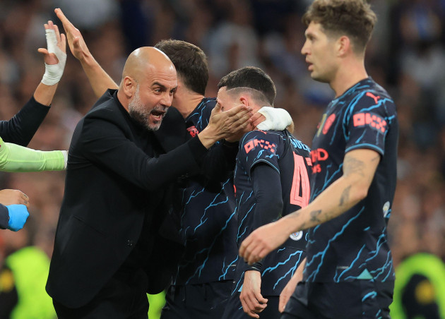madrid-spain-9th-apr-2024-phil-foden-of-manchester-city-c-celebrates-with-josep-guardiola-coach-of-manchester-city-after-scoring-his-teams-second-goal-during-the-uefa-champions-league-match-at-t