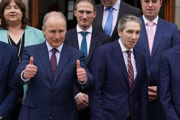 new-taoiseach-simon-harris-right-with-tanaiste-micheal-martin-left-ahead-of-a-photocall-with-his-newly-appointed-ministers-of-state-on-the-steps-of-the-government-buildings-in-dublin-picture-date