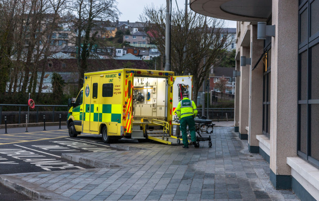 cork-city-cork-ireland-05th-april-2020-a-paramedic-loads-a-gurney-back-on-to-his-ambulance-after-admitting-a-patient-to-the-mercy-hospital-on-grenville-place-in-cork-city-ireland-credit-david