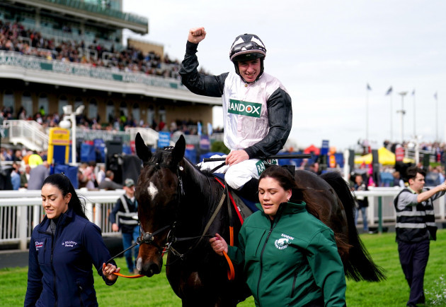 jockey-jack-kennedy-celebrates-on-gerri-colombe-after-winning-the-william-hill-bowl-chase-on-day-one-of-the-2024-randox-grand-national-festival-at-aintree-racecourse-liverpool-picture-date-thursday