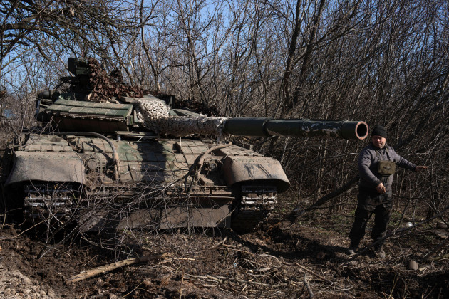 a-tanker-of-ukraines-17th-tank-brigade-removes-tree-branches-from-his-t-64-tank-in-chasiv-yar-the-site-of-fierce-battles-with-the-russian-troops-in-the-donetsk-region-ukraine-thursday-feb-29-20