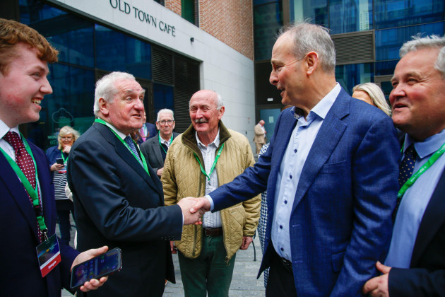 former-taoiseach-bertie-ahern-meets-and-shakes-hands-with-current-fianna-fail-leader-and-tanaiste-micheal-martin-as-he-arrives-at-the-fianna-fail-ard-fheis-at-the-dublin-royal-convention-centre-pict