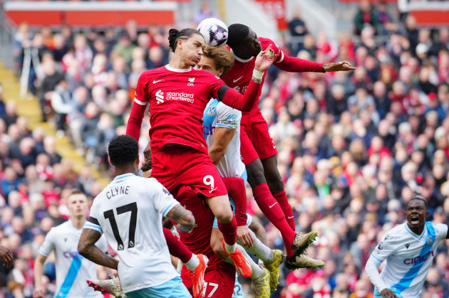 liverpools-darwin-nunez-centre-challenges-for-the-ball-with-crystal-palaces-joachim-andersen-during-the-english-premier-league-soccer-match-between-liverpool-and-crystal-palace-at-anfield-stadium