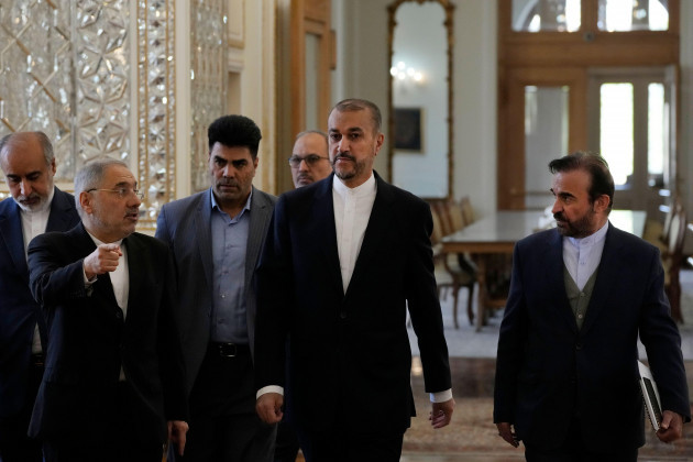 iranian-foreign-minister-hossein-amirabdollahian-center-arrives-for-a-meeting-with-foreign-ambassadors-and-envoys-to-tehran-iran-sunday-april-14-2024-iran-launched-its-first-direct-military-att