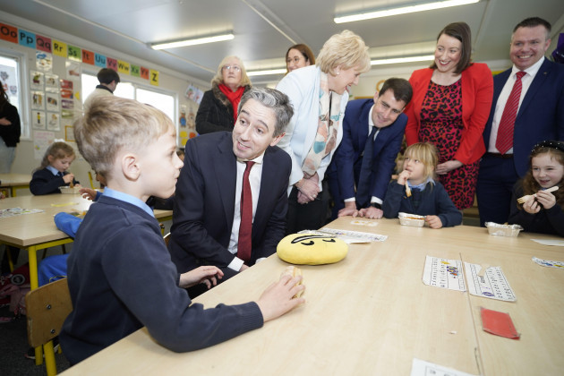 taoiseach-simon-harris-and-minister-for-social-protection-and-rural-and-community-development-heather-humphreys-meeting-school-children-during-the-announcement-at-st-thomas-junior-national-school-es