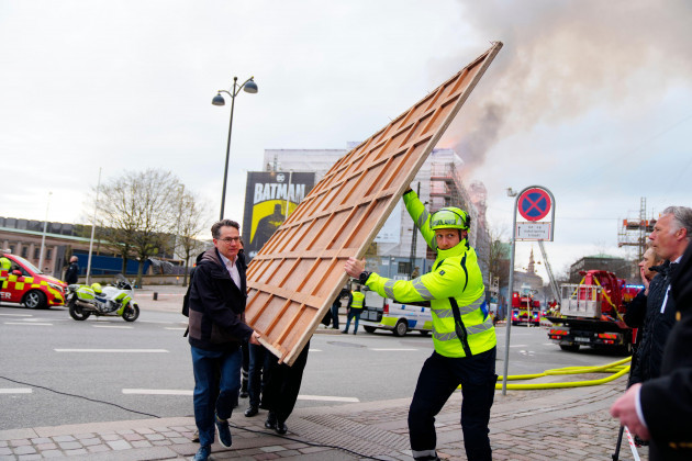 copenhagen-denmark-16th-apr-2024-former-danish-minister-of-culture-and-current-ceo-of-danish-business-dansk-erhverv-brian-mikkelsen-assists-with-the-evacuation-of-paintings-in-connection-with-t