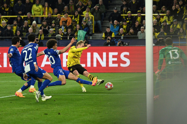 dortmunds-julian-brandt-right-scores-during-the-champions-league-quarterfinal-second-leg-soccer-match-between-borussia-dortmund-and-atletico-madrid-at-the-signal-iduna-park-in-dortmund-germany-tu