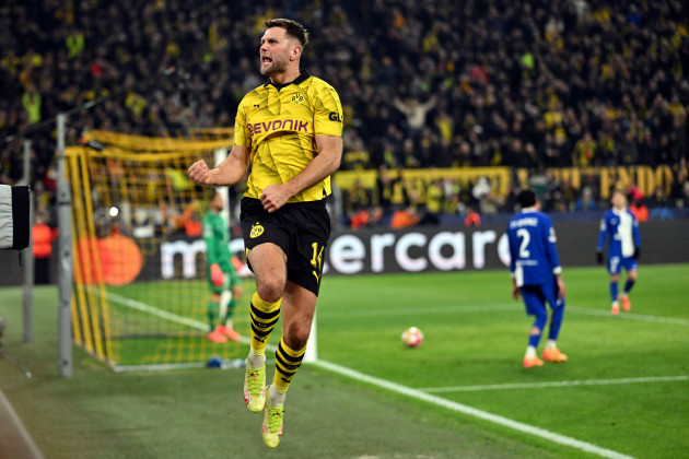 dortmunds-niclas-fuellkrug-celebrates-after-scoring-his-sides-third-goal-during-the-champions-league-quarterfinal-second-leg-soccer-match-between-borussia-dortmund-and-atletico-madrid-at-the-signal