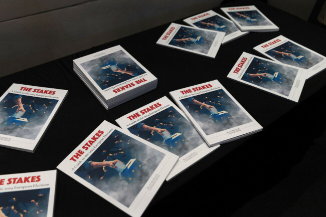 brussels-belgium-16th-apr-2024-a-book-titled-the-stakes-a-guide-to-the-2024-european-elections-is-seen-at-the-natcon-national-conservatism-conference-at-the-claridge-in-sint-joost-ten-node