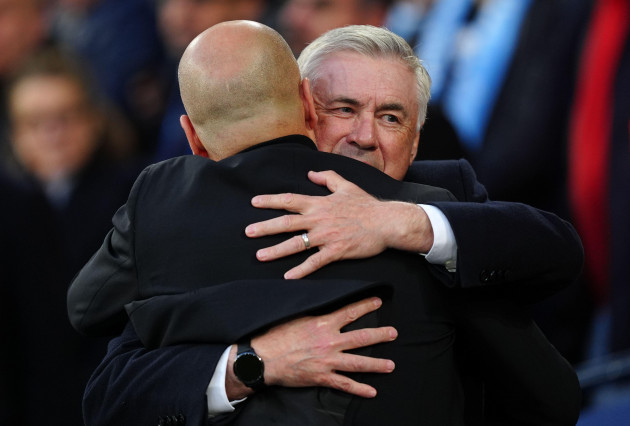 manchester-city-manager-pep-guardiola-with-real-madrid-head-coach-carlo-ancelotti-during-the-uefa-champions-league-quarter-final-second-leg-match-at-the-etihad-stadium-manchester-picture-date-wedn