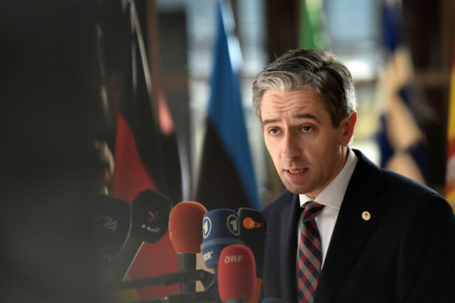 irelands-prime-minister-simon-harris-speaks-with-the-media-as-he-arrives-for-an-eu-summit-in-brussels-thursday-april-18-2024-european-union-leaders-vowed-on-wednesday-to-ramp-up-sanctions-against