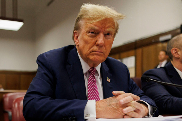 new-york-united-states-19th-apr-2024-former-president-donald-trump-sits-in-the-courtroom-at-manhattan-criminal-court-in-new-york-on-friday-april-19-2024-trump-is-facing-34-felony-criminal-charge