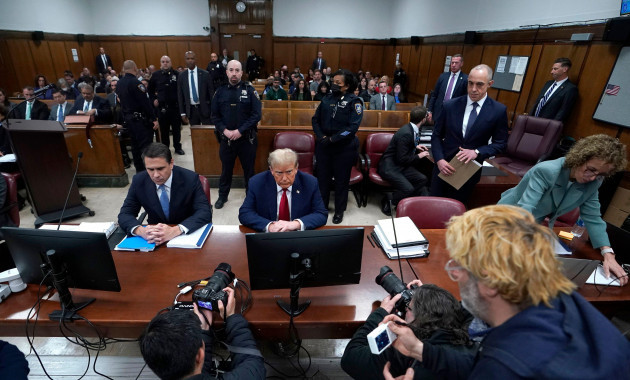 new-york-united-states-23rd-apr-2024-former-president-donald-trump-sits-in-the-courtroom-with-lawyer-todd-blanche-before-the-start-of-his-criminal-trial-at-manhattan-criminal-court-in-new-york-on