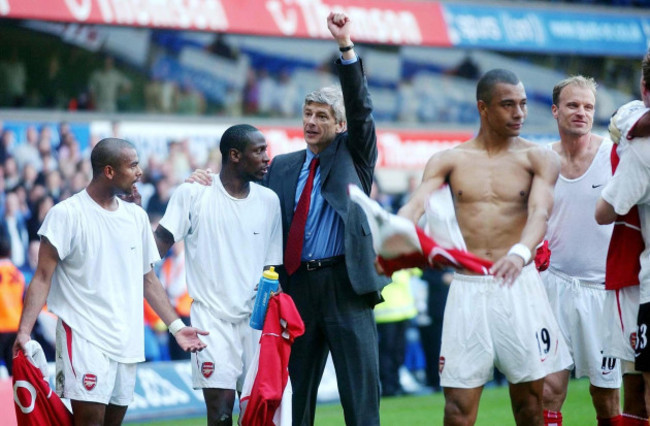 arsenal-manager-arsene-wenger-centre-celebrates-with-his-players-after-the-barclaycard-premiership-game-against-tottenham-hotspur-at-white-hart-lane-london-arsenal-are-the-premiership-champions-fo