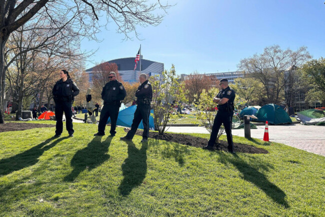 police-stand-on-the-campus-of-northeastern-university-as-they-clear-an-encampment-on-the-campus-in-boston-early-saturday-april-27-2024-ap-photomichael-casey
