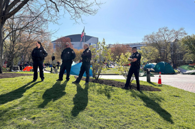 police-stand-on-the-campus-of-northeastern-university-as-they-clear-an-encampment-on-the-campus-in-boston-early-saturday-april-27-2024-ap-photomichael-casey