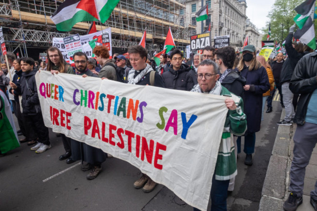 london-uk-27-april-2024-queer-christians-say-free-palestine-many-thousands-march-peacefully-through-london-from-parliament-square-to-hyde-park-in-another-huge-protest-demanding-an-immediate-perma