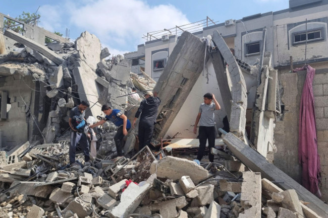 palestinians-look-at-the-destruction-after-an-israeli-airstrike-in-rafah-gaza-strip-monday-april-29-2024-ap-photomohammad-jahjouh