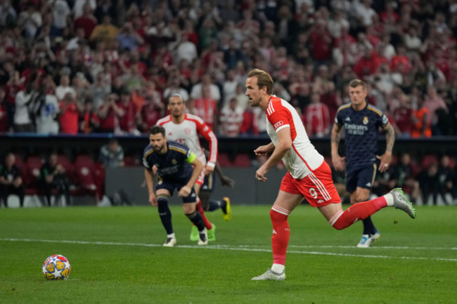 bayerns-harry-kane-scores-his-sides-second-goal-from-a-penalty-kick-during-the-champions-league-semifinal-first-leg-soccer-match-between-bayern-munich-and-real-madrid-at-the-allianz-arena-in-munich