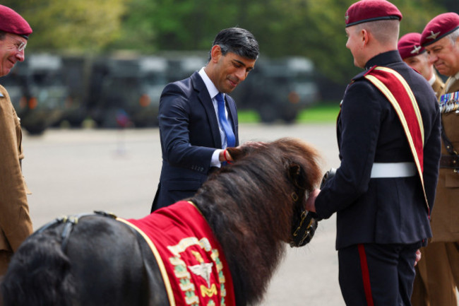 britains-prime-minister-rishi-sunak-pets-pegasus-v-a-shetland-pony-as-he-inspects-the-passing-out-parade-of-the-parachute-regiment-recruits-during-his-visit-to-the-helles-barracks-at-the-catteric