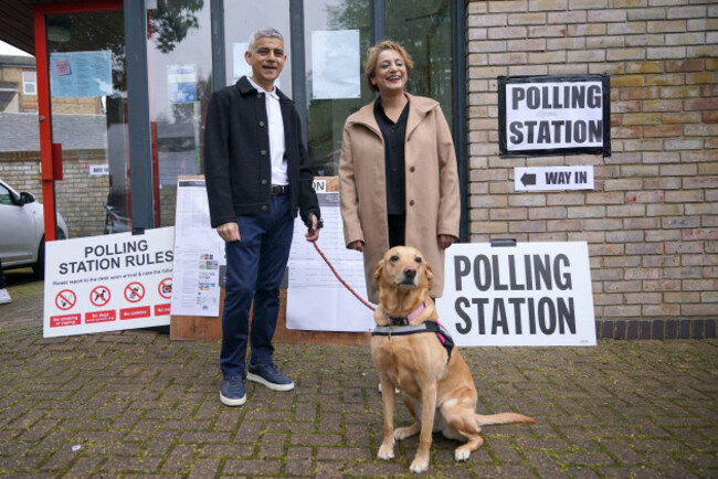 current-mayor-of-london-and-labour-party-candidate-sadiq-khan-with-his-wife-saadiya-khan-and-dog-luna-at-the-polling-station-at-st-albans-church-south-london-to-cast-his-vote-in-the-local-and-lond