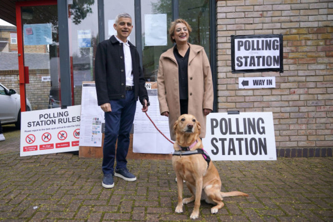 current-mayor-of-london-and-labour-party-candidate-sadiq-khan-with-his-wife-saadiya-khan-and-dog-luna-at-the-polling-station-at-st-albans-church-south-london-to-cast-his-vote-in-the-local-and-lond