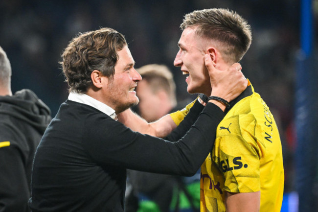 paris-france-france-7th-may-2024-edin-terzic-of-borussia-dortmund-and-nico-schlotterbeck-of-borussia-dortmund-celebrate-the-victory-during-the-uefa-champions-league-match-between-paris-saint-germ