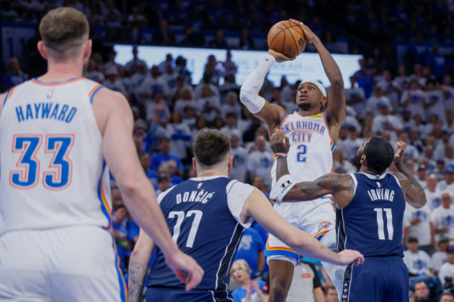 oklahoma-city-thunder-guard-shai-gilgeous-alexander-2-shoots-against-dallas-mavericks-guard-kyrie-irving-11-and-guard-luka-doncic-77-during-the-second-half-of-game-1-of-an-nba-basketball-second
