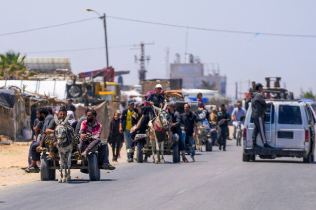 file-displaced-palestinians-arrive-in-central-gaza-after-fleeing-from-the-southern-gaza-city-of-rafah-in-deir-al-balah-gaza-strip-on-thursday-may-9-2024-palestinians-on-wednesday-may-15-2024