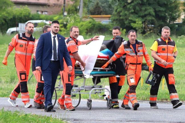 rescue-workers-wheel-slovak-prime-minister-robert-fico-who-was-shot-and-injured-to-a-hospital-in-the-town-of-banska-bystrica-central-slovakia-wednesday-may-15-2024-jan-kroslaktasr-via-ap