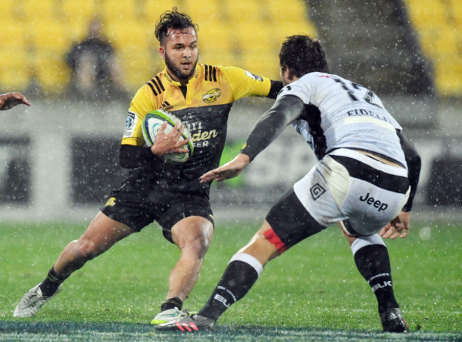 jamison-gibson-park-of-the-hurricanes-left-steps-inside-andre-esterhuizen-of-the-sharks-during-the-quarter-final-super-rugby-match-between-the-hurricanes-and-the-sharks-at-westpac-stadium-in-welling