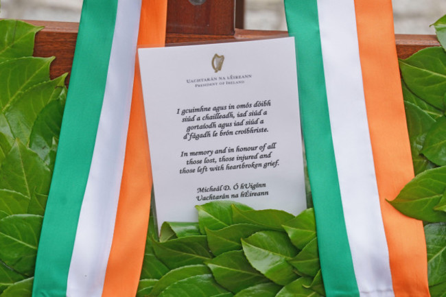 a-message-on-a-wreath-to-be-laid-by-president-of-ireland-michael-d-higgins-during-a-wreath-laying-ceremony-at-the-memorial-to-the-victims-of-the-dublin-and-monaghan-bombings-on-talbot-street-in-dublin