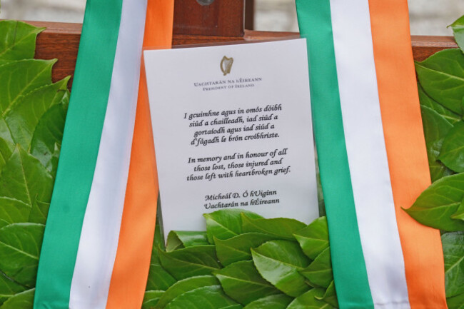 a-message-on-a-wreath-to-be-laid-by-president-of-ireland-michael-d-higgins-during-a-wreath-laying-ceremony-at-the-memorial-to-the-victims-of-the-dublin-and-monaghan-bombings-on-talbot-street-in-dublin