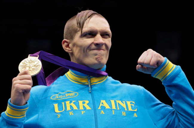 ukraines-oleksandr-usyk-holds-his-gold-medal-after-winning-the-mens-heavyweight-91-kg-boxing-competition-at-the-2012-summer-olympics-saturday-aug-11-2012-in-london-ap-photoivan-sekretarev