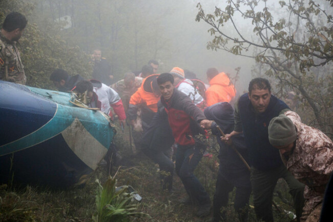 in-this-photo-provided-by-moj-news-agency-rescue-team-members-work-at-the-scene-of-a-crash-of-a-helicopter-carrying-iranian-president-ebrahim-raisi-in-varzaghan-in-northwestern-iran-monday-may-20