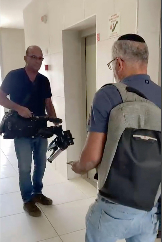 in-this-image-from-video-israeli-officials-seize-ap-video-equipment-from-an-apartment-block-in-sderot-southern-israel-tuesday-may-21-2024-israeli-officials-seized-the-camera-and-broadcasting-equ